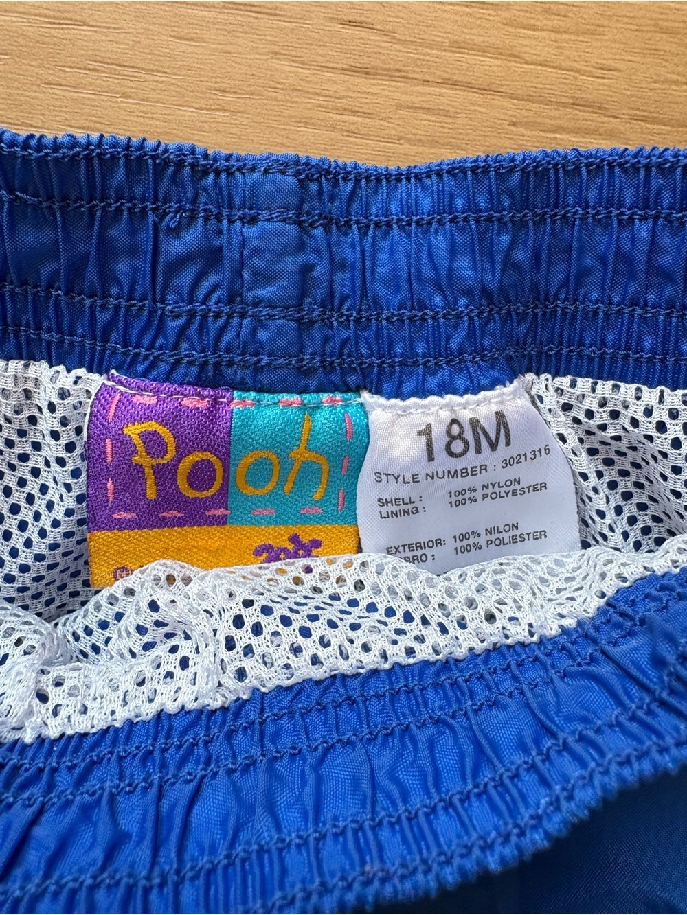 Blue and Green Kids Swim Trunks with Tigger Graphic - Picture 6 of 6